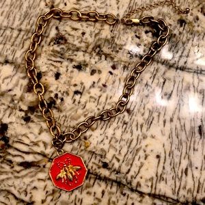 Gold chain statement necklace with coral honey bee medallion